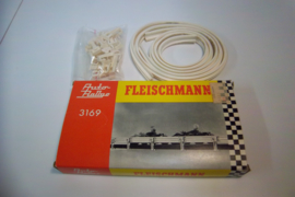 Fleischmann Auto-Rallye.  Flexibele vangrails + klemmen nr. 3169  in OVP geel