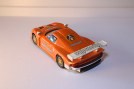 Scalextric Porsche 911 GT1 Oranje/Jägermeister 'Huisvlijt'