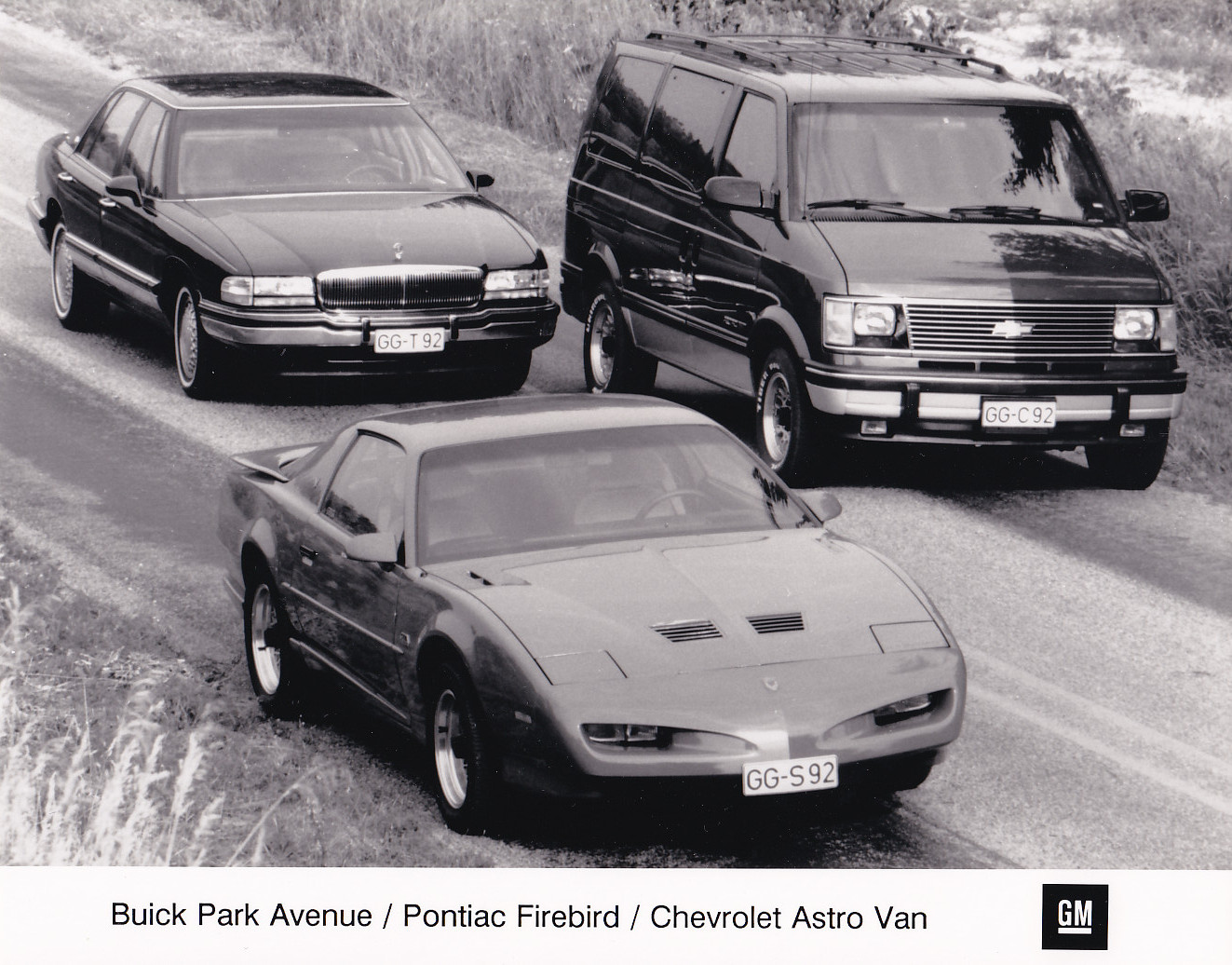 Buick Park Avenue / Pontiac Firebird / Chevrolet Astro Van, large press photo, German, 9/1991