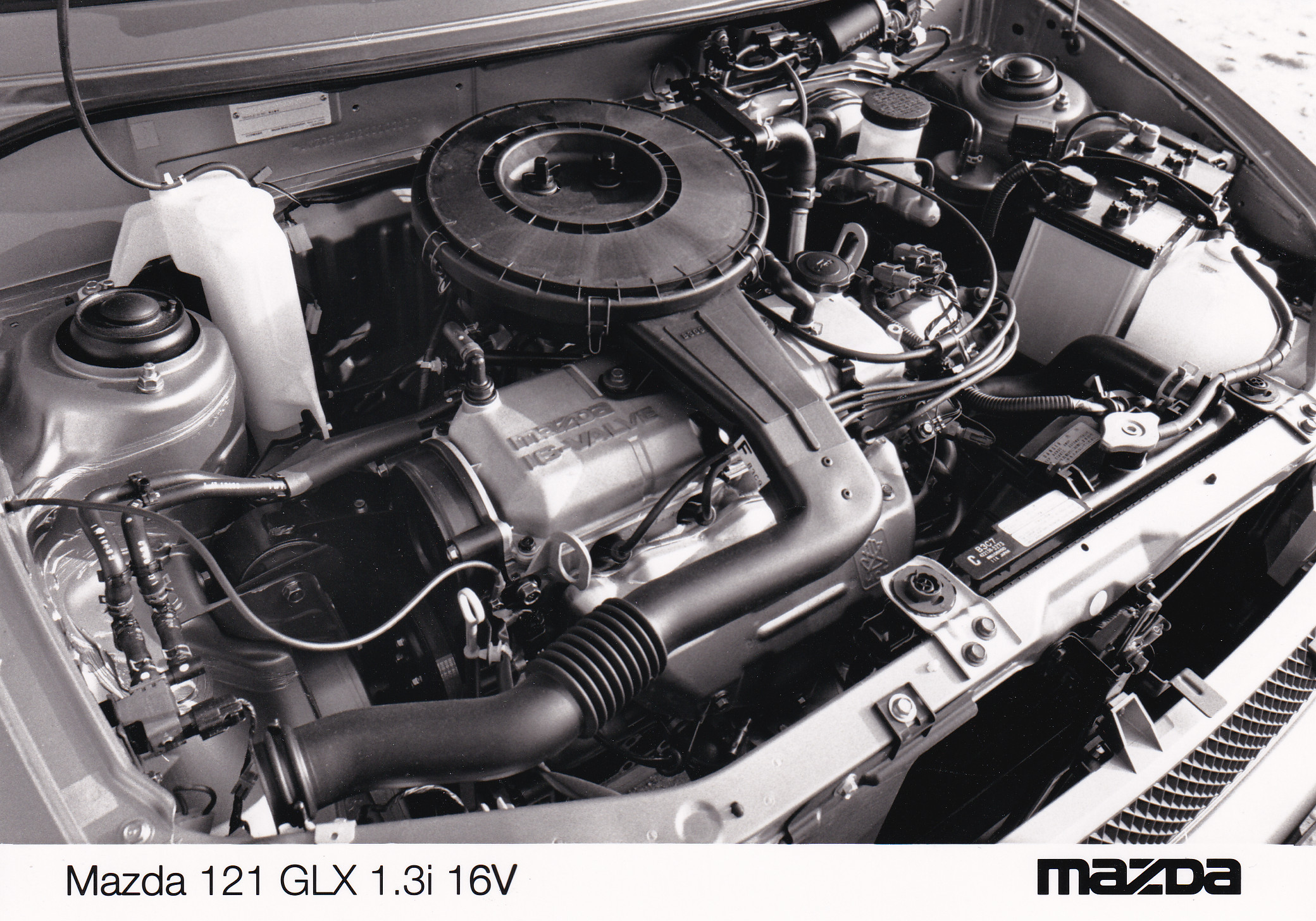 Mazda 121 GLX 1.3i 16V engine, press photo, Belgium, 1991