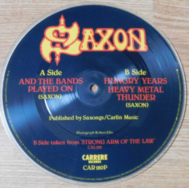Saxon - And the band Played on