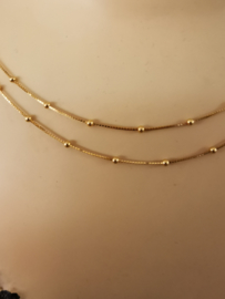 Goud op zilver collier met bolletjes