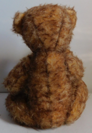 Oude brocante duim zuigende teddybeer