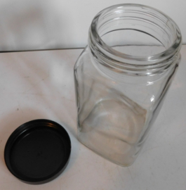 Kleine Antiek glazen voorraad pot met bakelieten deksel.