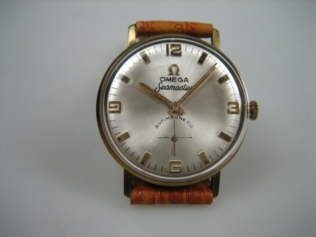 Gouden 18 karaat Omega Seamaster 1961 | Antiekjuwelier | Gouden Omega's