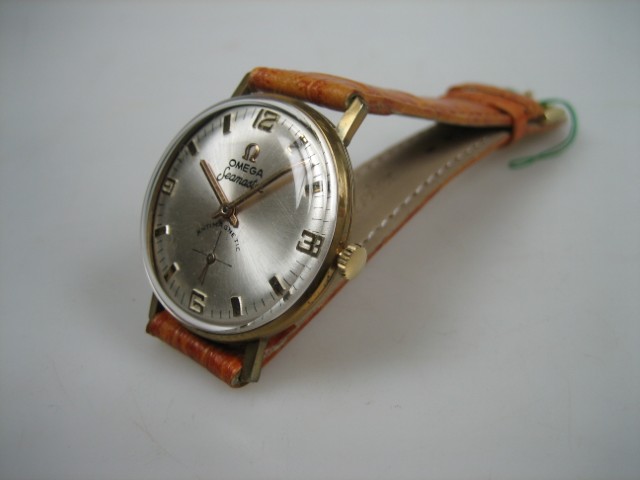 Gouden 18 karaat Omega Seamaster 1961 | Antiekjuwelier | Gouden Omega's