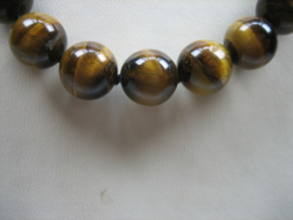 Tijgeroog collier geheel geknoopt met zilveren Cartier sluiting uit eigen ateliers