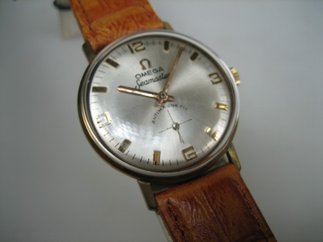 Gouden 18 karaat Omega Seamaster 1961 | Antiekjuwelier | Gouden Omega's