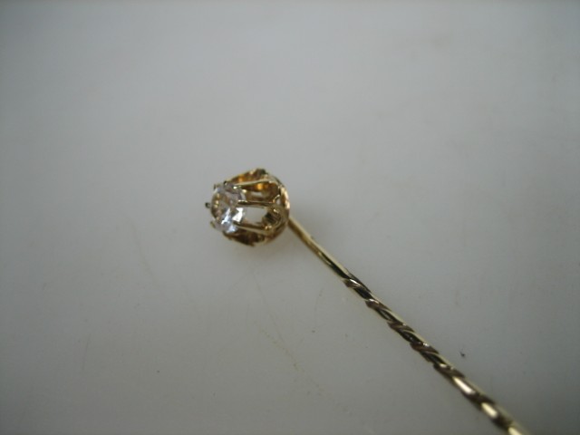 Gouden 14 Karaat dasspeld met grote echte Zirkonia uit ca. 1935 item