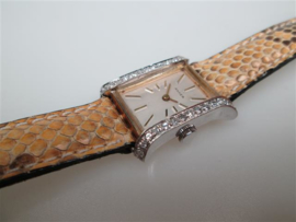 Zwitsers Gouden 14 karaat dames horloge met 24 Briljanten ca.1963