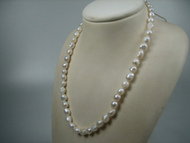Barok Parels met  zilveren Cartier sluiting uit eigen import