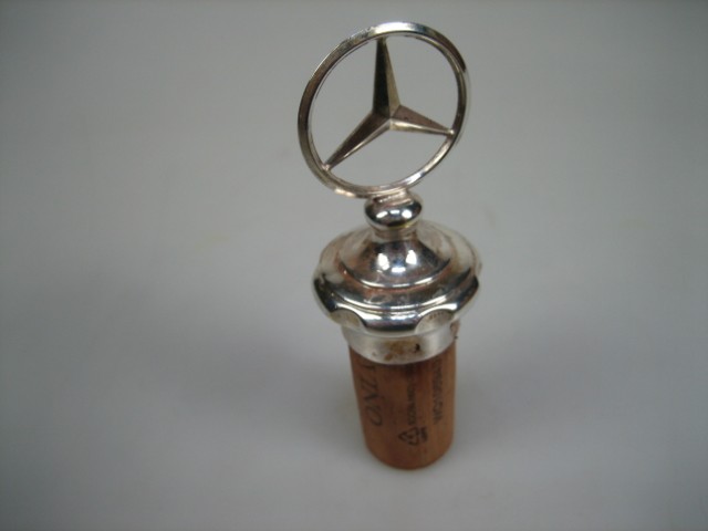 Zilveren oude Wijn dop met Mercedes embleem uit ca. 1930