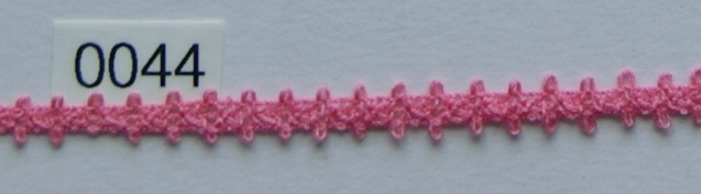 Kant roze schulpjes 1 cm breed.