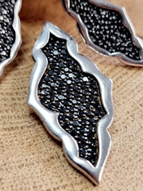 Echt zilveren set, met stainless steel creolen.