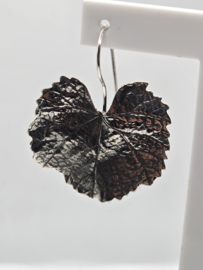 Echt zilveren hanger blad plus oorbellen.