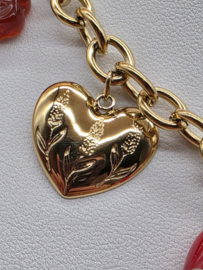 collier met zon, klaver, hart, vogel, bloem, geglazuurd keramiek, hars