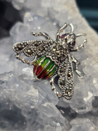925 zilveren broche, met Robijn.