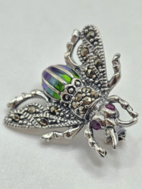 925 zilveren broche, met Robijn.