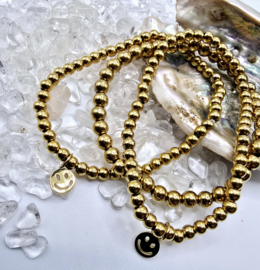 Stainless steel armbanden elastisch zilver 4 mm met smiley. Goud