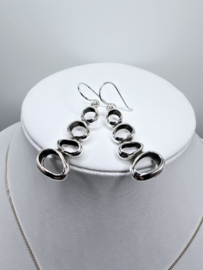 Echt zilveren hanger fantasie plus oorbellen.