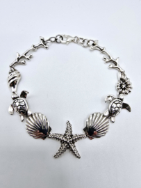 Echt zilveren armband met zee figuren.