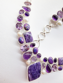 Schitterend 925 zilveren sieraden set, paars tinten.