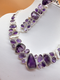Schitterend 925 zilveren sieraden set, paars tinten.