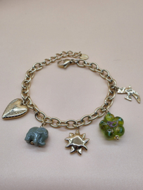 Armband met zon, bloem, olifant, hart, gegraveerde vogel, klaver