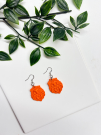 2 Love It Lion Clay - oorbellen - zilver met oranje leeuwenkopjes
