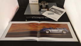 Porsche Carrera GT owners box with engine block sculpture, brochure and video