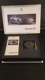Porsche Carrera GT owners box with engine block sculpture, brochure and video
