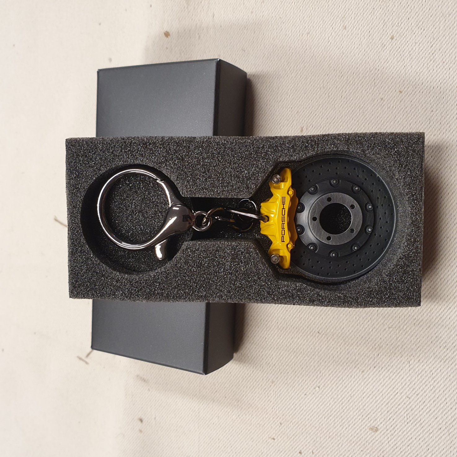 Sleutelhanger Porsche remschijf met gele remklauw - WAP0503700PSAB
