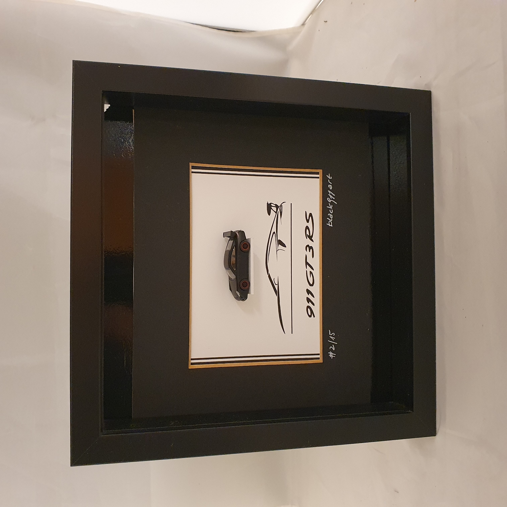 Porsche 911 991 GT3RS zwart in kaderbox - schaal 1:87