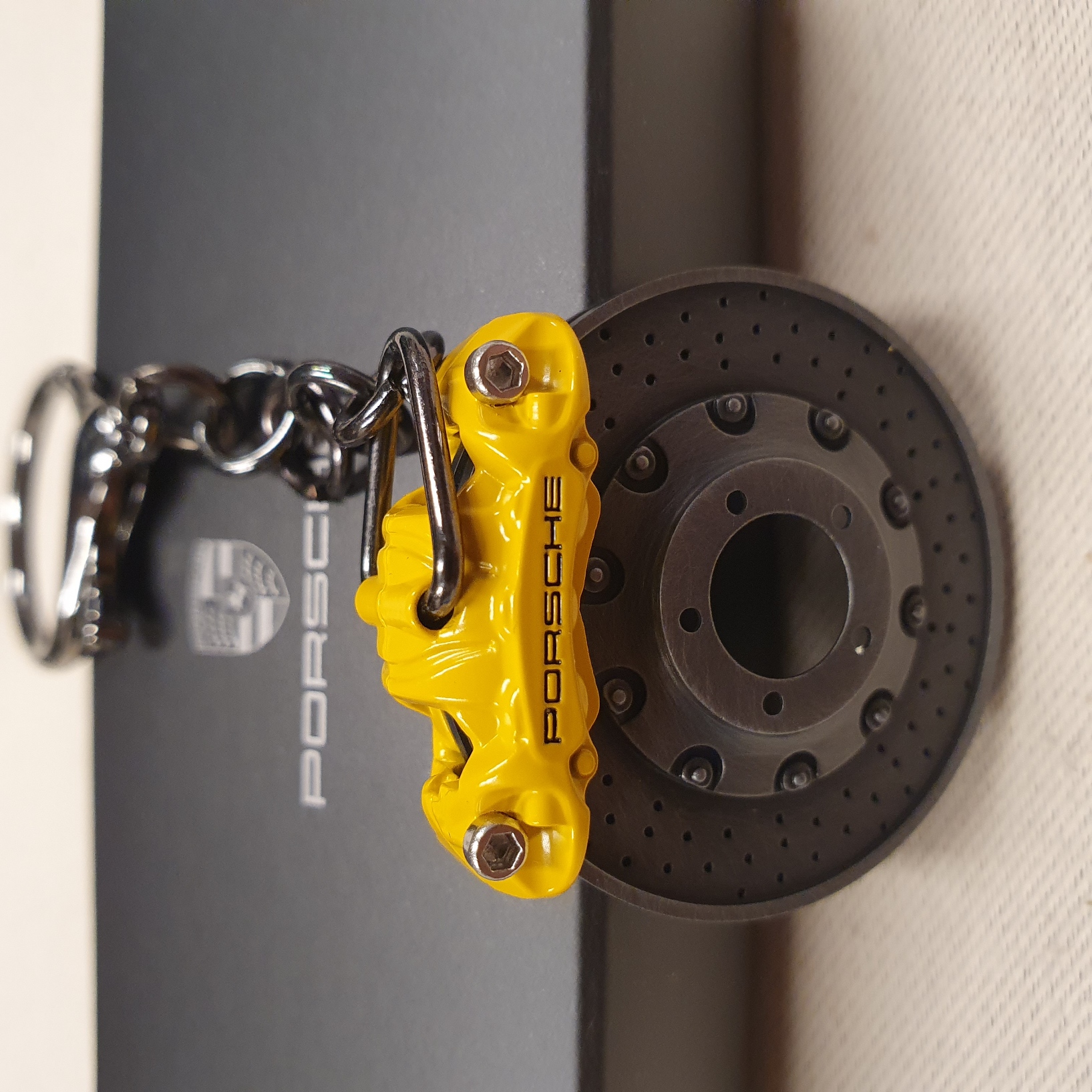 Sleutelhanger Porsche remschijf met gele remklauw - WAP0503700PSAB