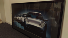 Porsche 911 generaties kunstwerk ingelijst met verlichting