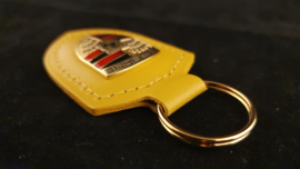 Porsche Schlüsselanhänger mit Porsche Emblem - Speed Gelb