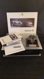 Porsche Carrera GT owners box with engine block sculpture, brochure and video