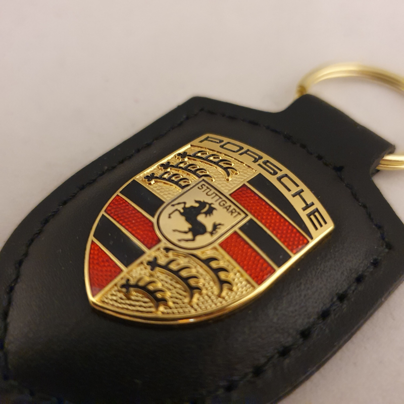 Porsche Schlüsselanhänger mit Porsche Emblem - Schwarz WAP0500900E, Porsche  Schlüsselanhänger