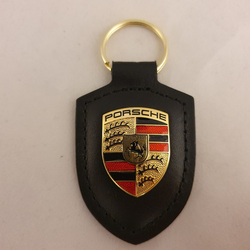 Porsche Schlüsselanhänger mit Porsche Emblem - Schwarz WAP0500900E, Porsche  Schlüsselanhänger