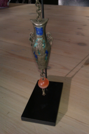 Oude hanger met "kan"eraan