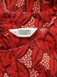 Toast top. Mt. 12. All over print.