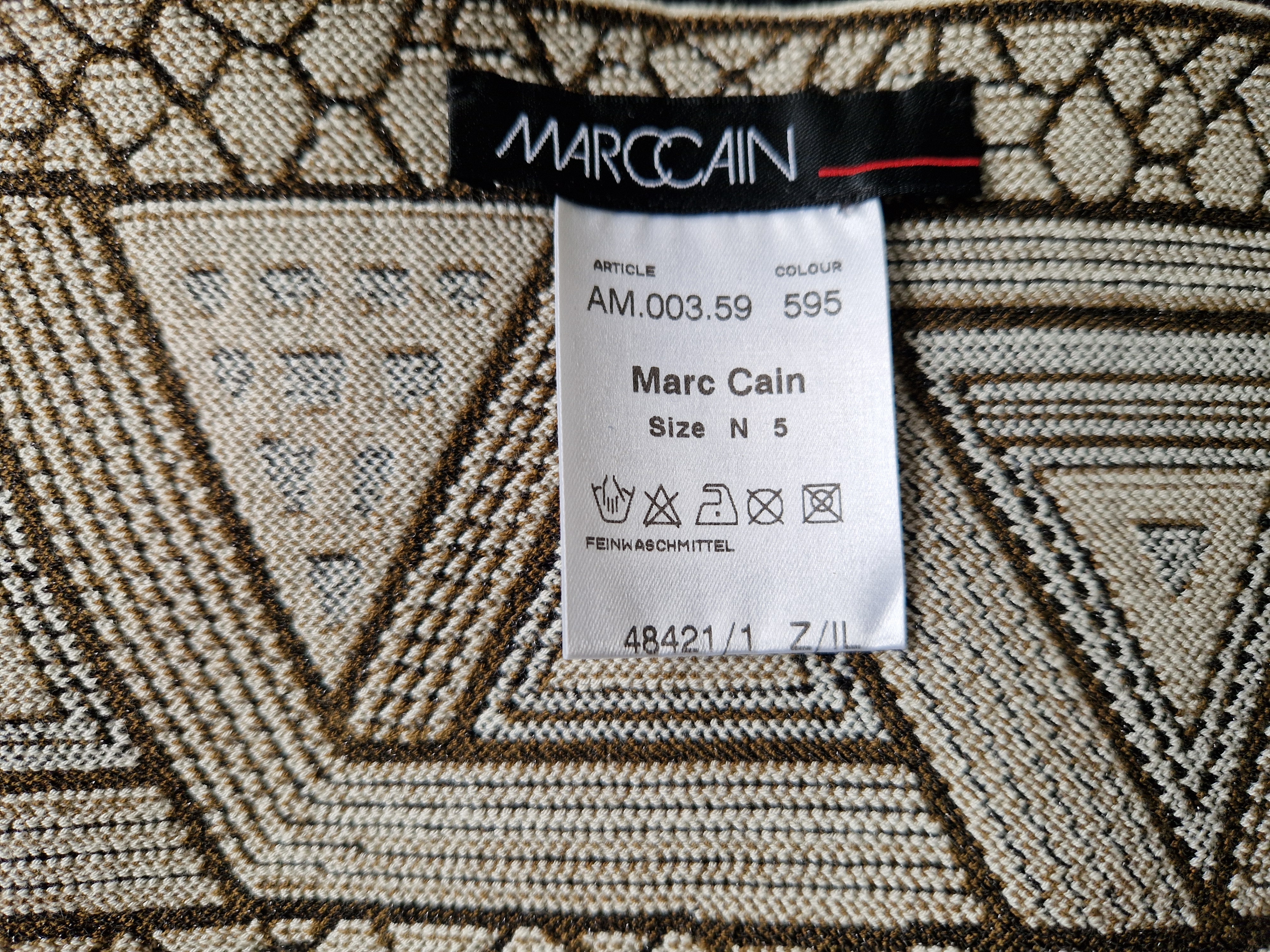 Marc Cain elastische tailleriem. Maat 5. Crème/zwart