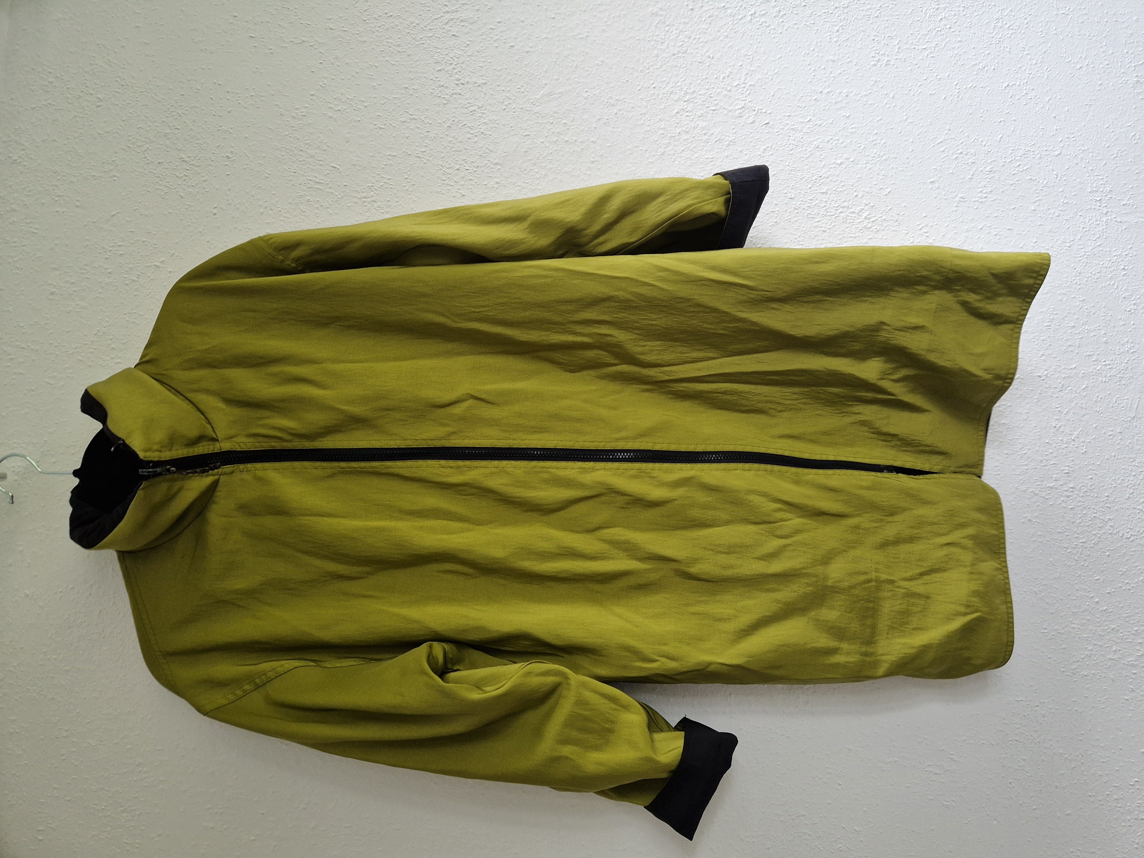 Mycra Pac reversibel regenjas. Maat M. Zwart/limegroen.