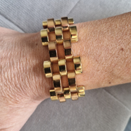 Michael Kors schakelarmband.Stainless steel. Rosé/goud.