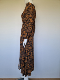 Juffrouw Jansen wikkeljurk. Maat S. Botanische print.