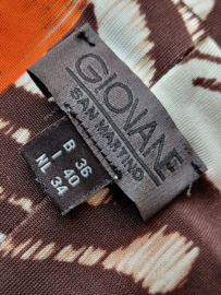 Giovane zomerjurk. Maat 34. Bruin/oranje/roze/print.