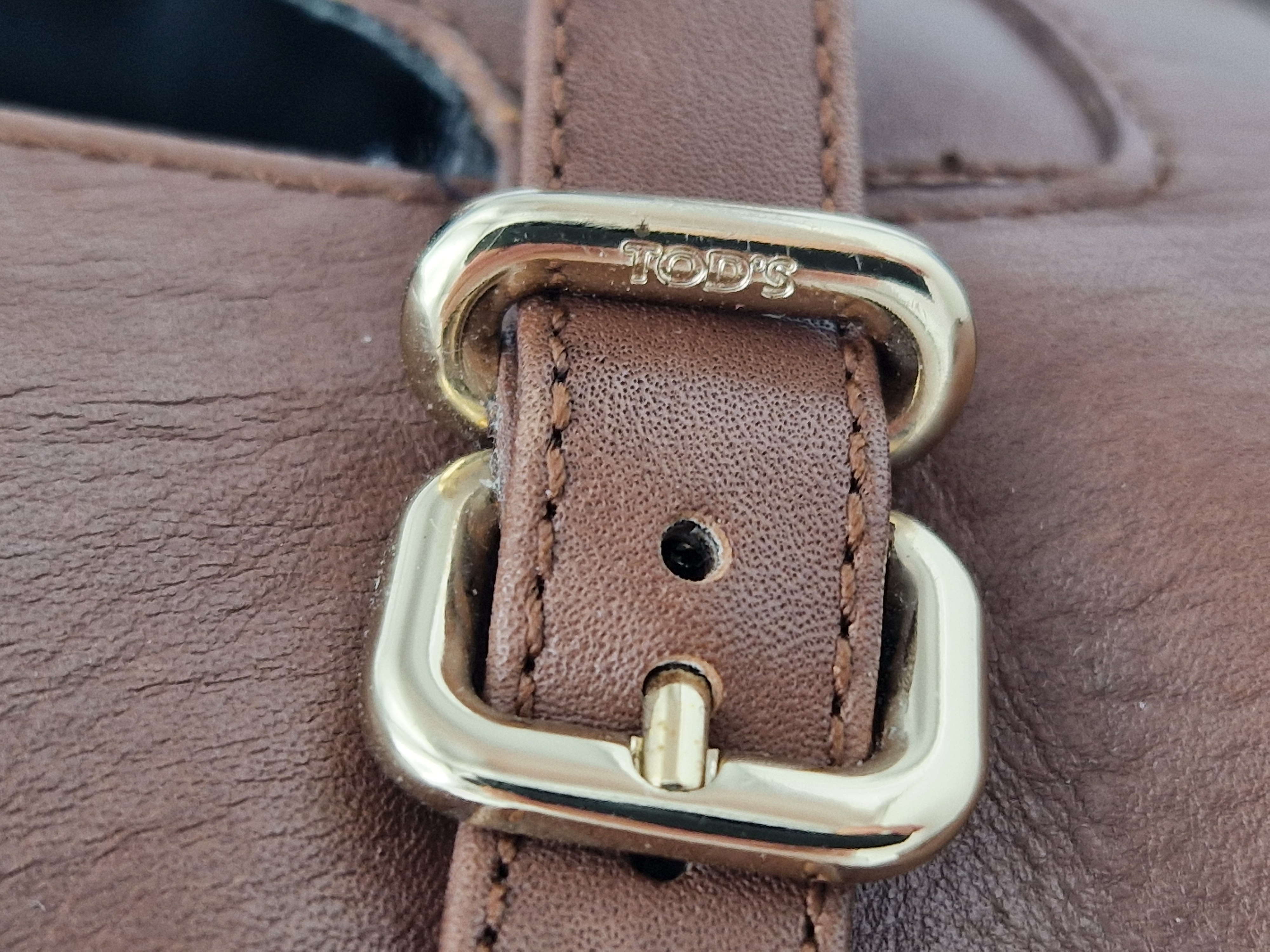 Tod's enkellaarsjes. Maat 40. Bruin/leer.