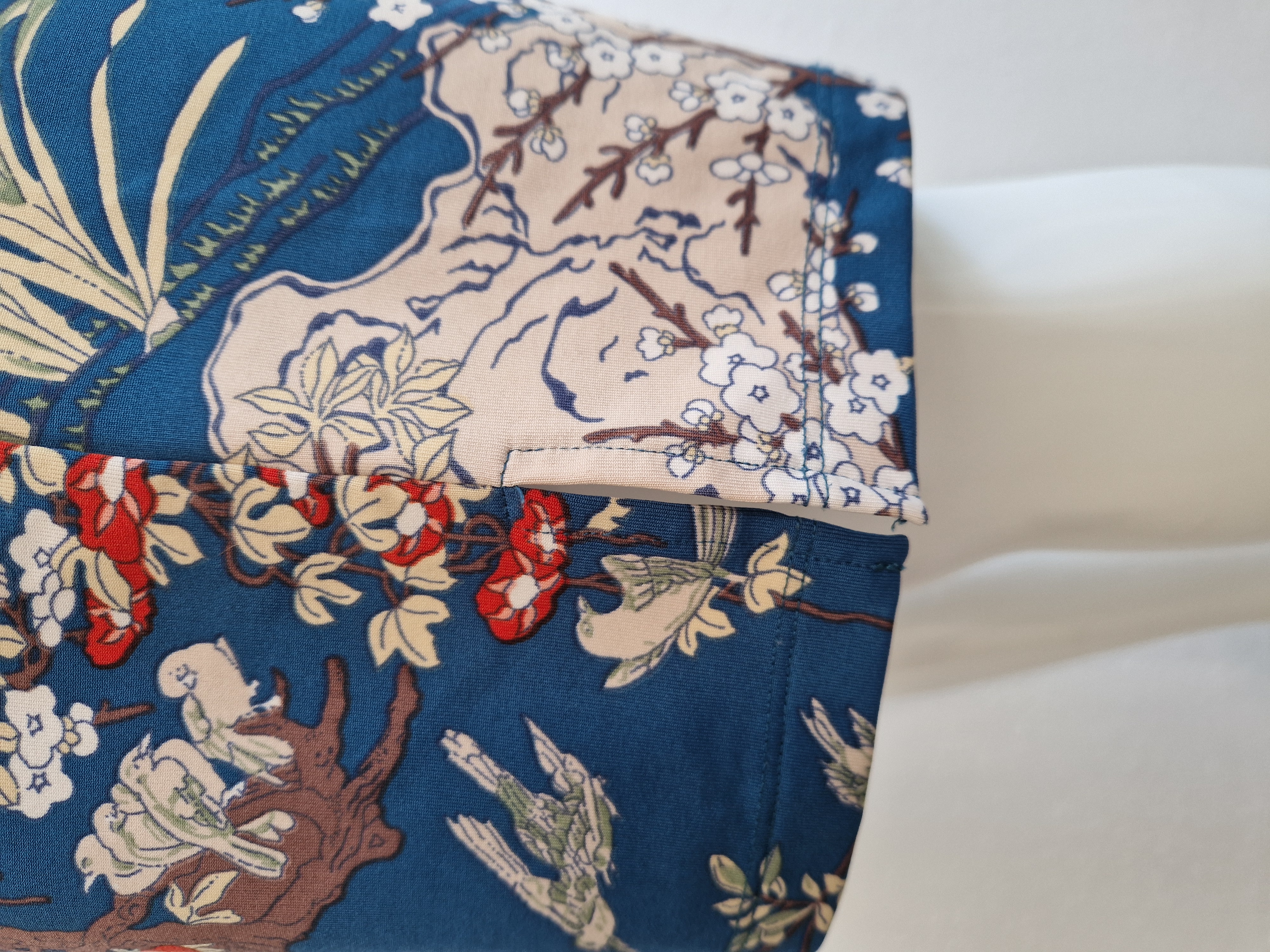 King Louie jurk. Maat L. Petrol/Japanse print.