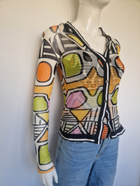 Top en vest. Maat 38. All over print.