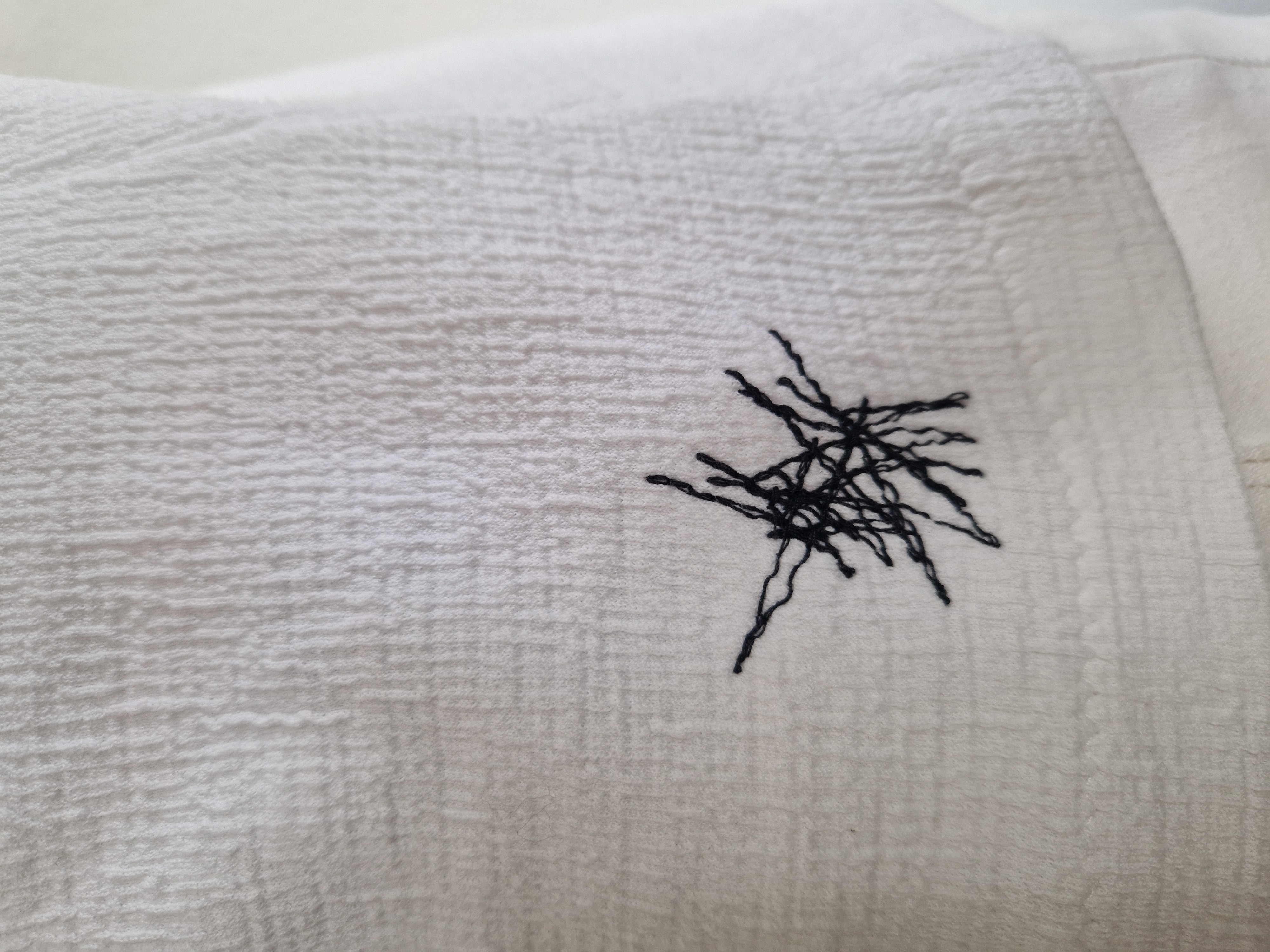 Irma Borgsteede top. Maat M. Wit/grafische print.